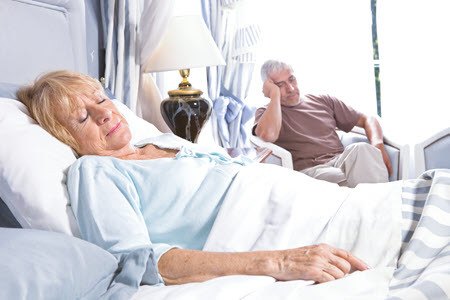 Retired couple, women sleeping, man can not sleep because of wife's sleep apnea 