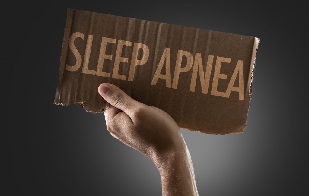 Sign with the words "sleep apnea" printed on it